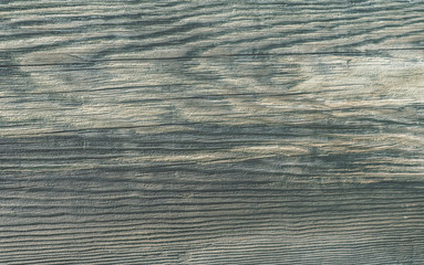 pale brown-green wooden surface