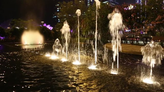 Fountain in the square in the modern district of Macao in the evening