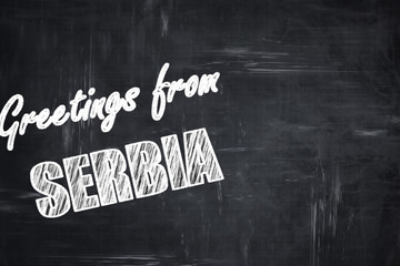 Chalkboard background with chalk letters: Greetings from serbia