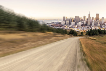 empty rural road and cityscape of san francisco
