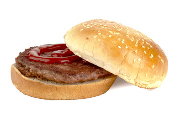 unhealthy burger sandwich with ketchup