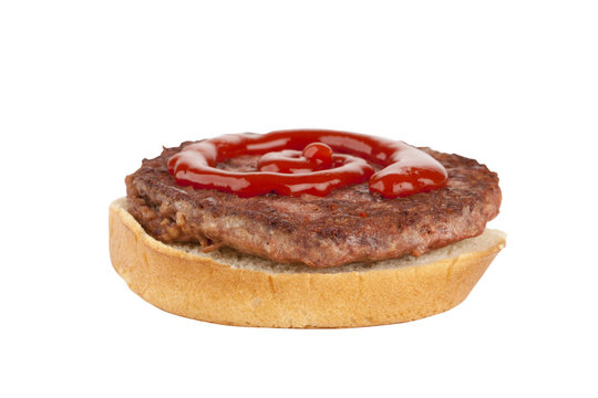 burger sandwich topped with ketchup