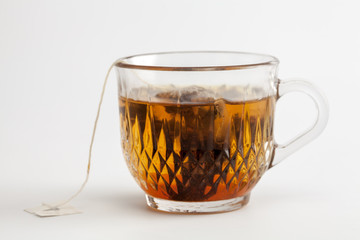 hot tea clear glass white background