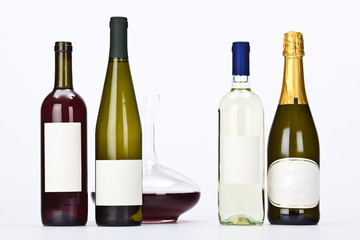 Obraz premium red white wine bottle composition set isolated on white