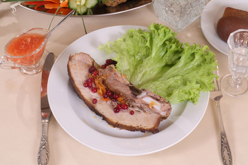 pork stuffed with vegetables served with cranberries