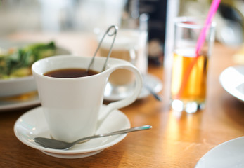 Cup of tea on the table in cafe.