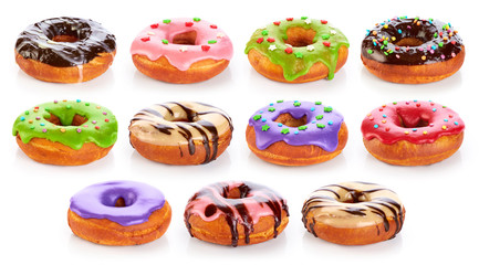 Obraz na płótnie Canvas Donuts with colored glaze and chocolate, isolated on white backg