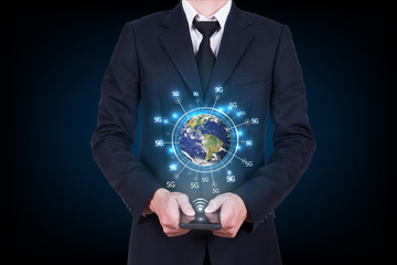 wide web connection concept. Hand holding mobile phone connected browsing internet worldwide world map background. 5g data plan provider. Elements of this image are furnished by NASA