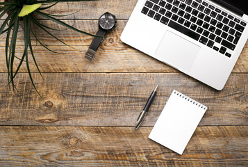 Comfortable working place at wooden table