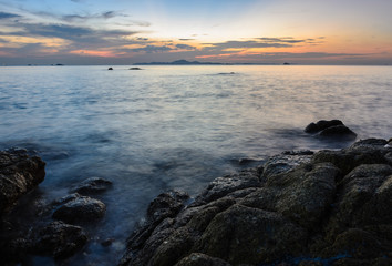 Rock beach sunset skyline