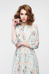 portrait of a lovely woman in casual romantic summer dress