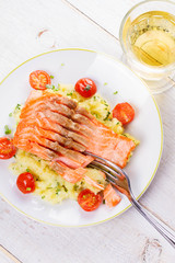 Salmon, Tomato and Smashed Potato with  Spring Onion and Coriander. View From Above, Top Studio Shot