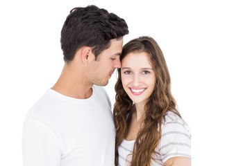 Cute couple embracing and looking the camera