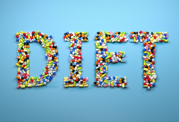 Concept of dieting. Word diet made of colorful pills and capsule