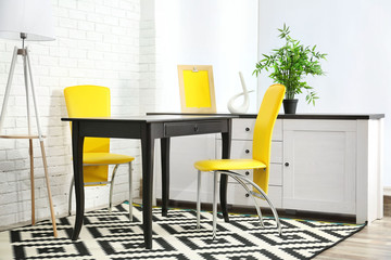 Modern room design. Furniture set with table and chairs.