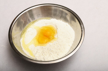 Bowl with flour and eggs