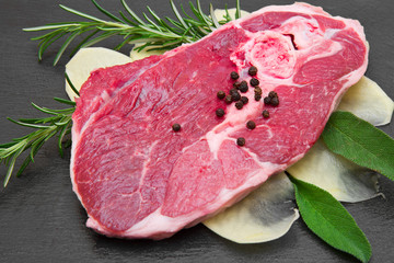 raw lamb with potatoes and rosemary and sage © Lsantilli