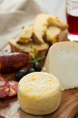 cheese with smoked sausage, bread and red wine