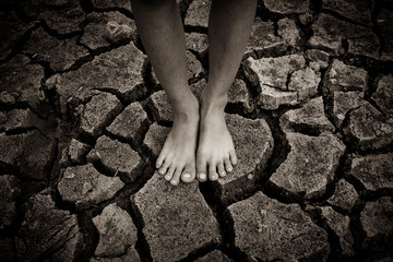 A lone poor children in the arid area