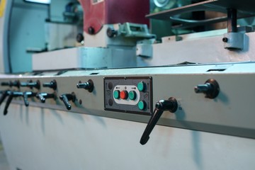 Control panel with buttons and levers on machine