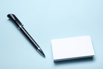 Business card blank over office table. Corporate stationery branding mock-up