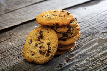 Chocolate chip cookies, on wooden surface