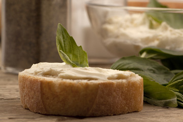 cream cheese and basil on bread