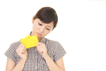 Obraz premium 財布を持つ女性