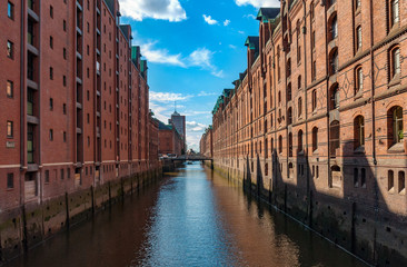 Naklejka premium Hamburg old trading building and storehouses in Speicherstadt, part of Hafen City. Hamburg, Germany