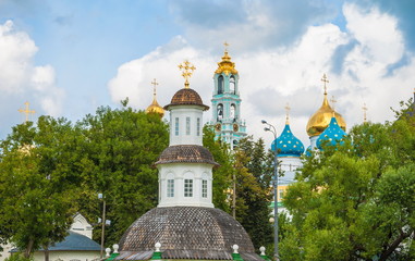Fototapeta na wymiar View of the bell tower and dome of the Trinity-Sergius Lavra