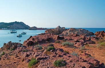 Photo sur Plexiglas Cala Pregonda, île de Minorque, Espagne Minorca, isole Baleari, Spagna: la sabbia rossa a Cala Pregonda il 15 luglio 2013. La spiaggia della baia nascosta di Cala Pregonda, con la sua sabbia e le sue rocce rosse, è simile al pianeta Marte