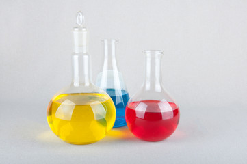 Different forms laboratory glasswares and liquid inside