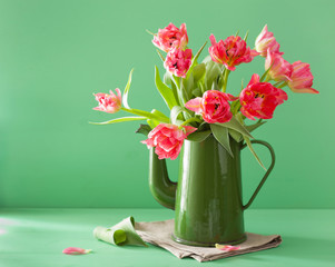 beautiful pink tulip flowers bouquet in green pot