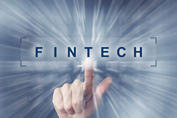 hand clicking on fintech or Financial technology button