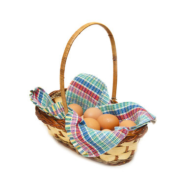 Eggs in a basket isolated