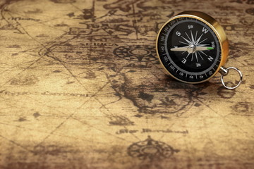 Close Up Of Magnetic Compass On The Old Map
