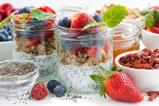 Breakfast in a jar, chia with berries and oat flakes 
