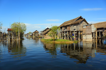 Fototapeta na wymiar Stilted houses in village on Inle lake