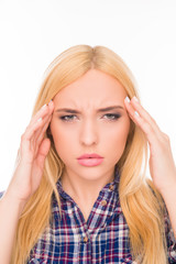 Fototapeta premium Close up portrait of tired girl suffering from headache