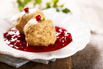 German dumplings with berries sauce
