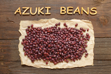 Raw azuki beans with wooden word