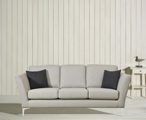 Modern Grey Sofa in Rustic White wood room