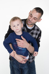 Joyful father hugging his son isolated on white