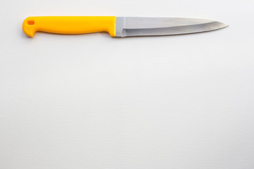 Knife with a yellow handle