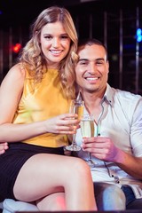 Smiling couple with champagne