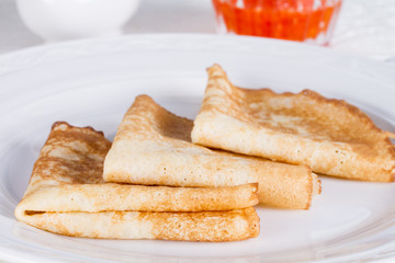 Russian pancakes with red salmon caviar