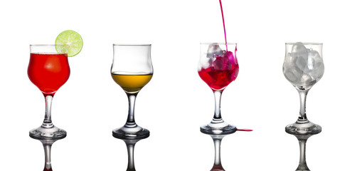 A variety of drinks in glasses.On white background.