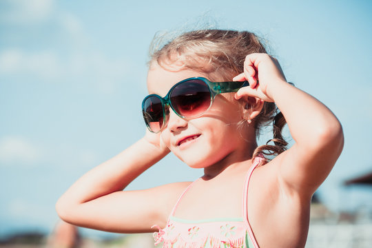 beautiful little girl with sunglasses