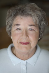 Close-up of a senior woman looking at the camera