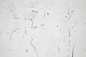 Weiße Mauertextur mit Rissen